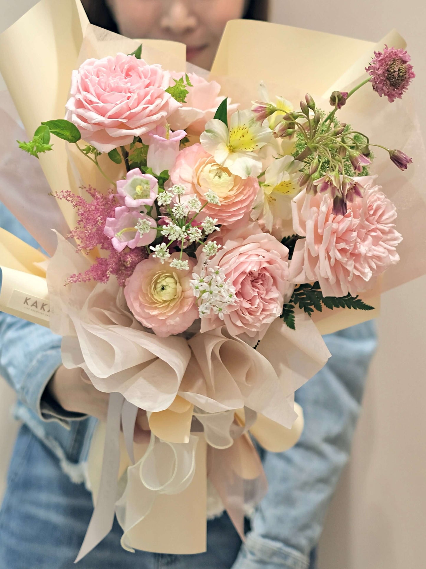 Pink roses with leaves bouquet