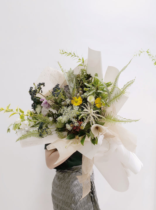 GREENERY BOUQUET with leaves and flowers in white background